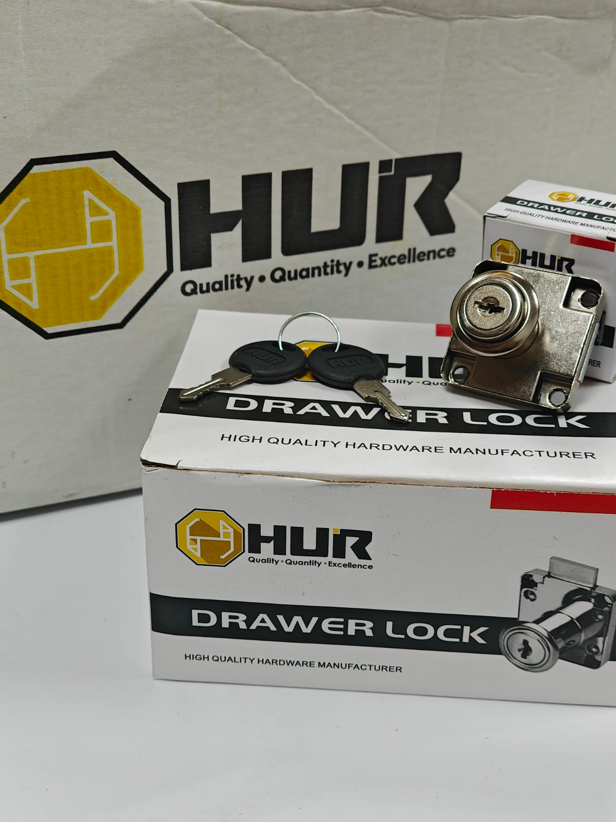 HUR furniture hinge installed on a cabinet